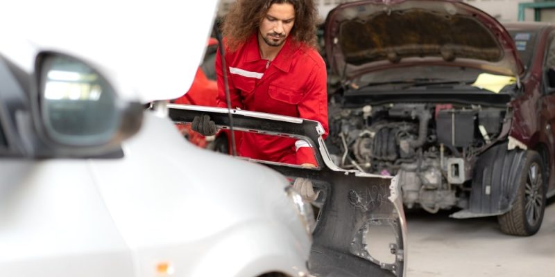 Repairman,Mechanic,Matching,Automobile,Body,Front,Bumper,And,Assembly,On